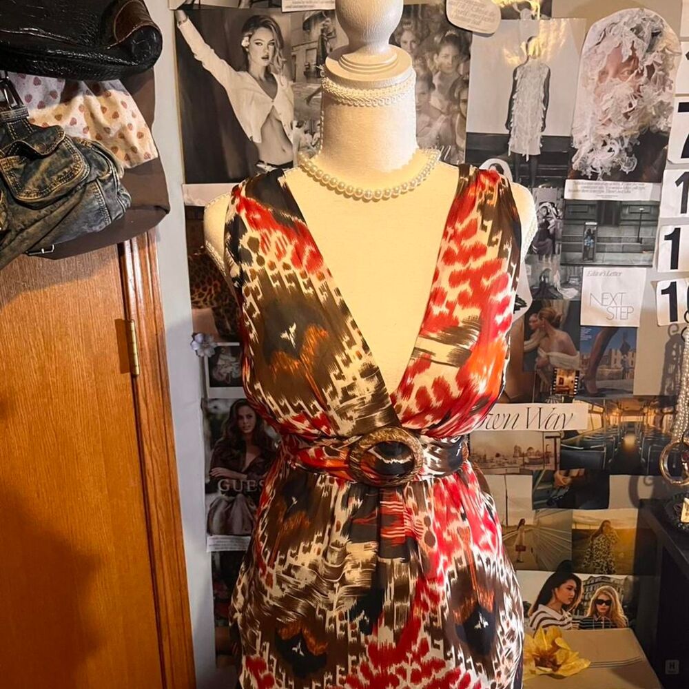 Red and brown deep v neck baby doll blouse with a wooden circle waist buckle